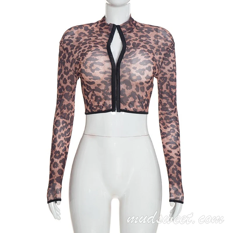 Top met lange mouwen, luipaardprint, mesh, ritssluiting en hoge hals.