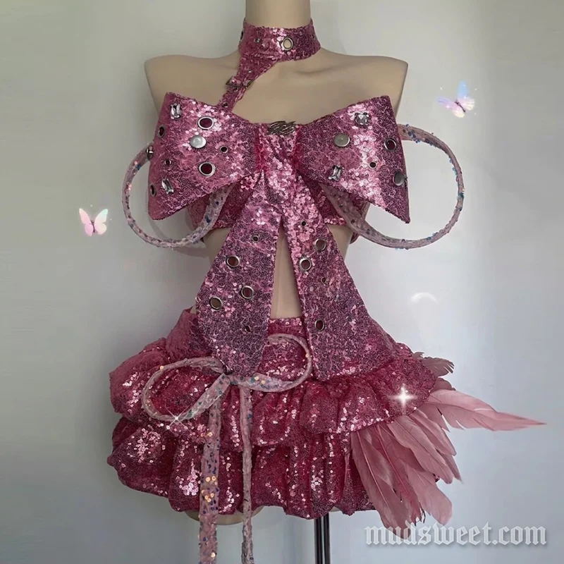 Minirokje met strik, glitter en uitgeholde veren