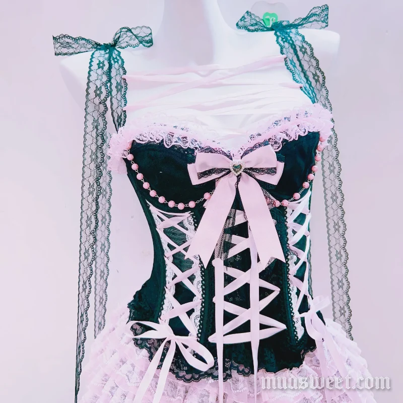 Fairycore cami top met vetersluiting, strik en kralen.