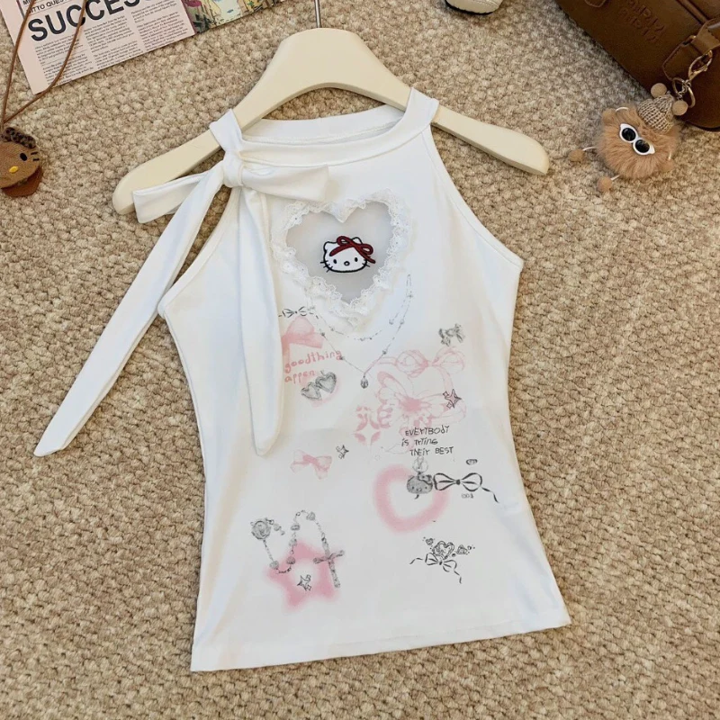 Top met zelfstrik en ruches in "hello kitty"-patroon