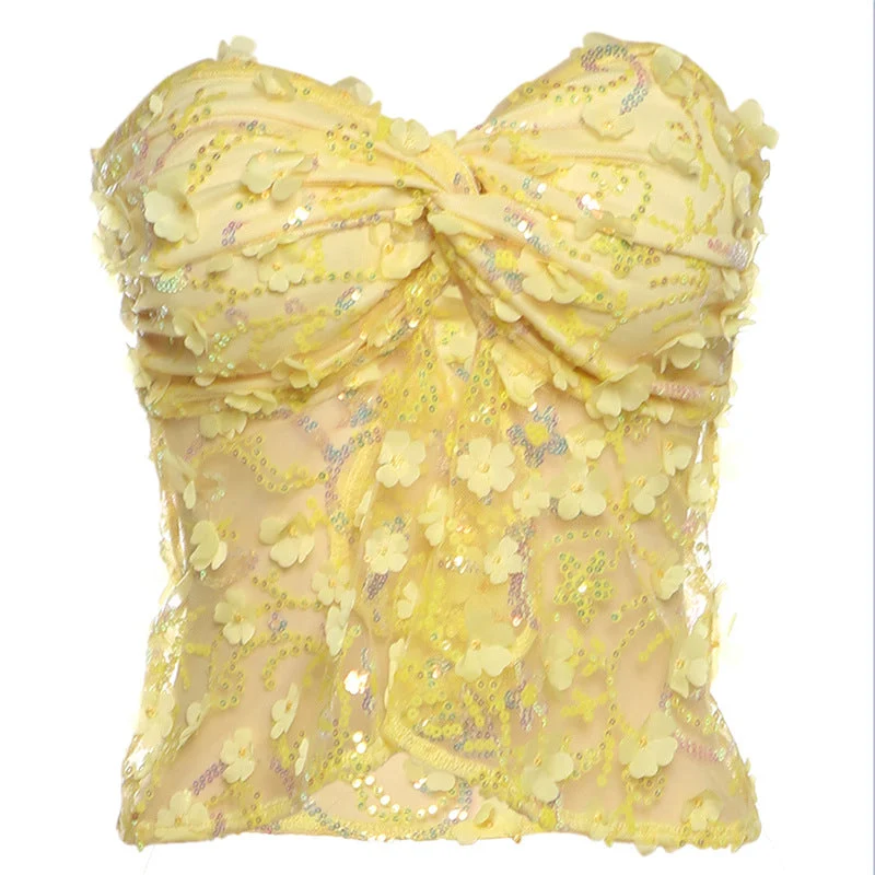 Topje met glitterbloemapplicatie en open rug