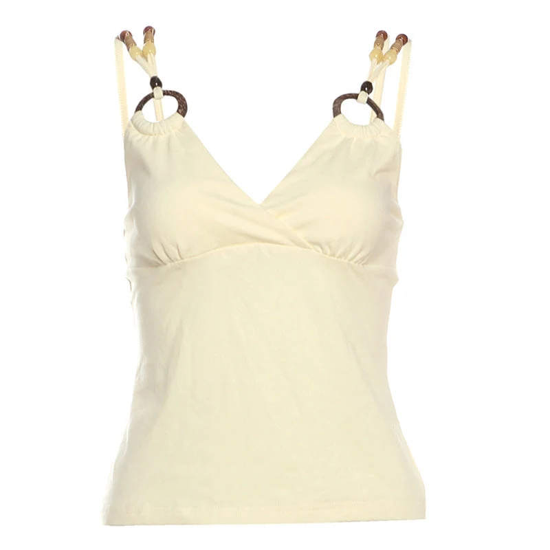 Grunge cami top met V-hals, O-ring en kralen.