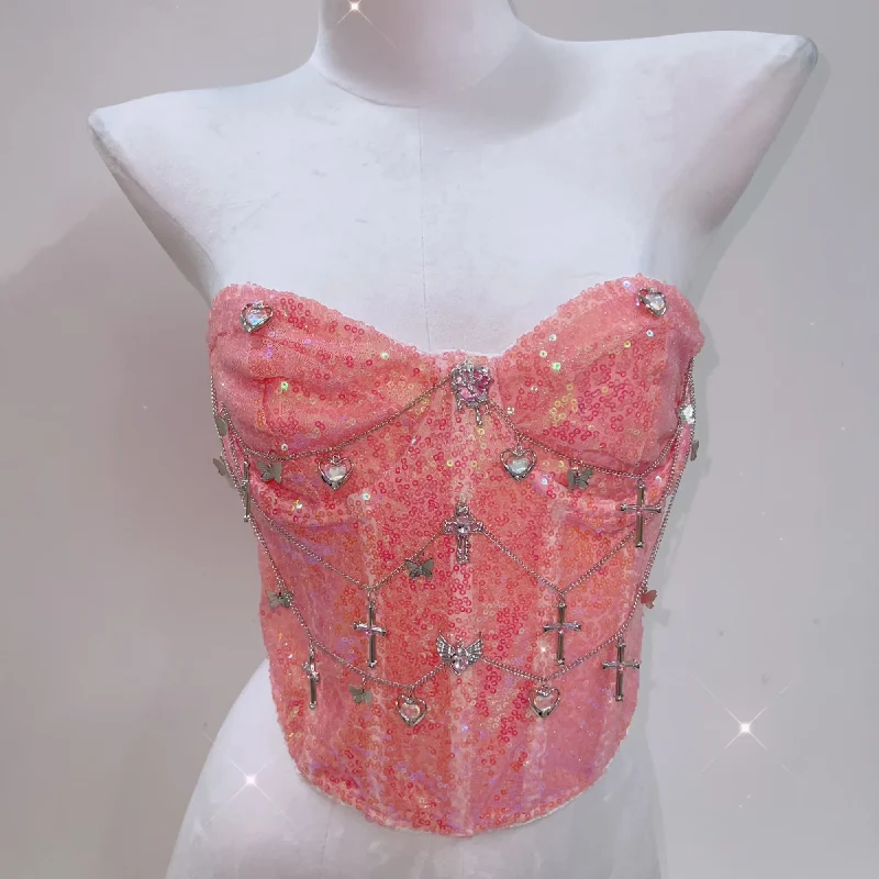 Tubetop met glitterende metalen ketting en vlinderapplicatie