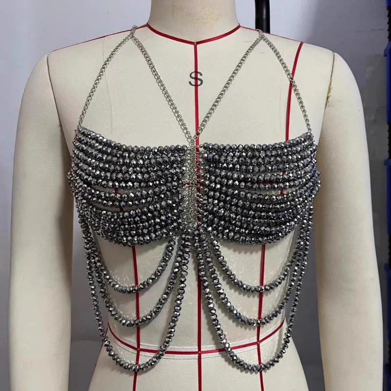 Cami-top met kralenketting en holle achterkant
