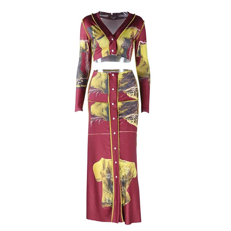 Set van een maxi-rok met lange mouwen, V-hals en knoopjesprint