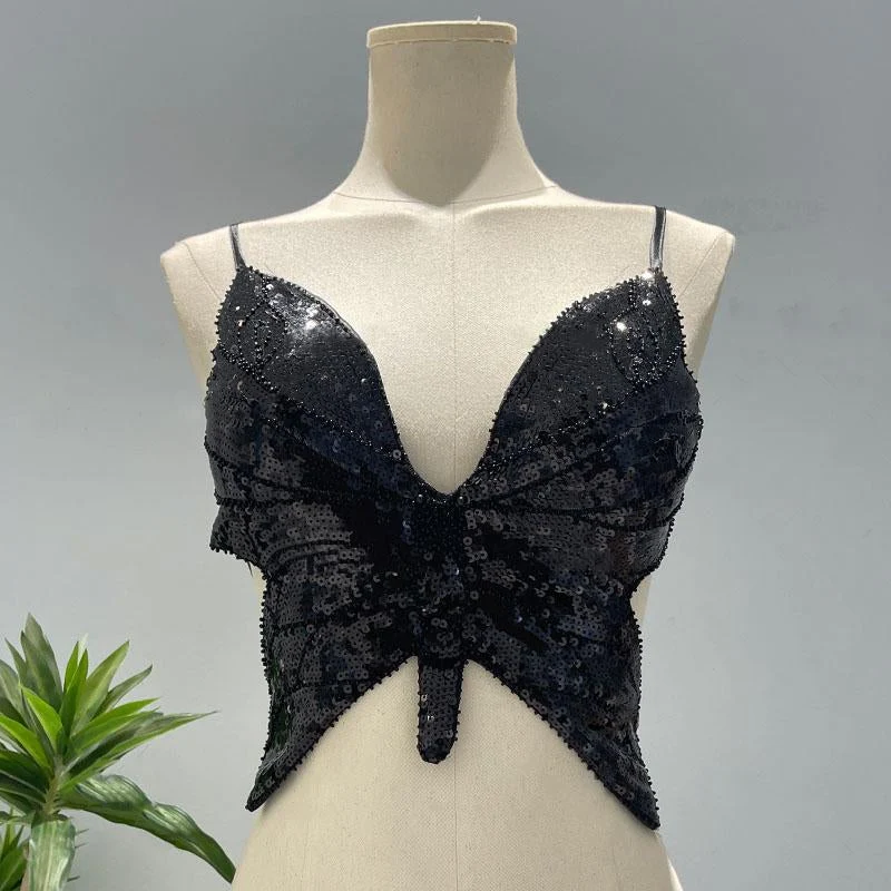 Gotische cami top met diepe V-hals, glitter en gekruiste rug.