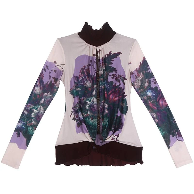 Top met lange mouwen, hoge hals, ruches en kralenprint