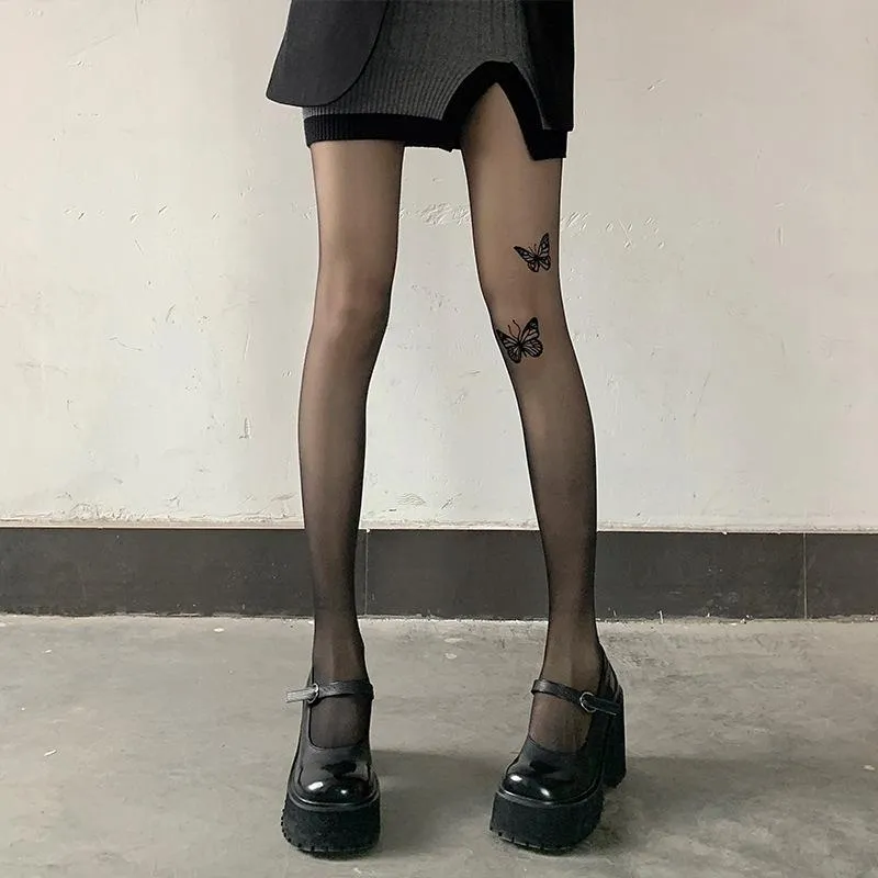 Effen panty met vlinderprint en doorschijnende mesh