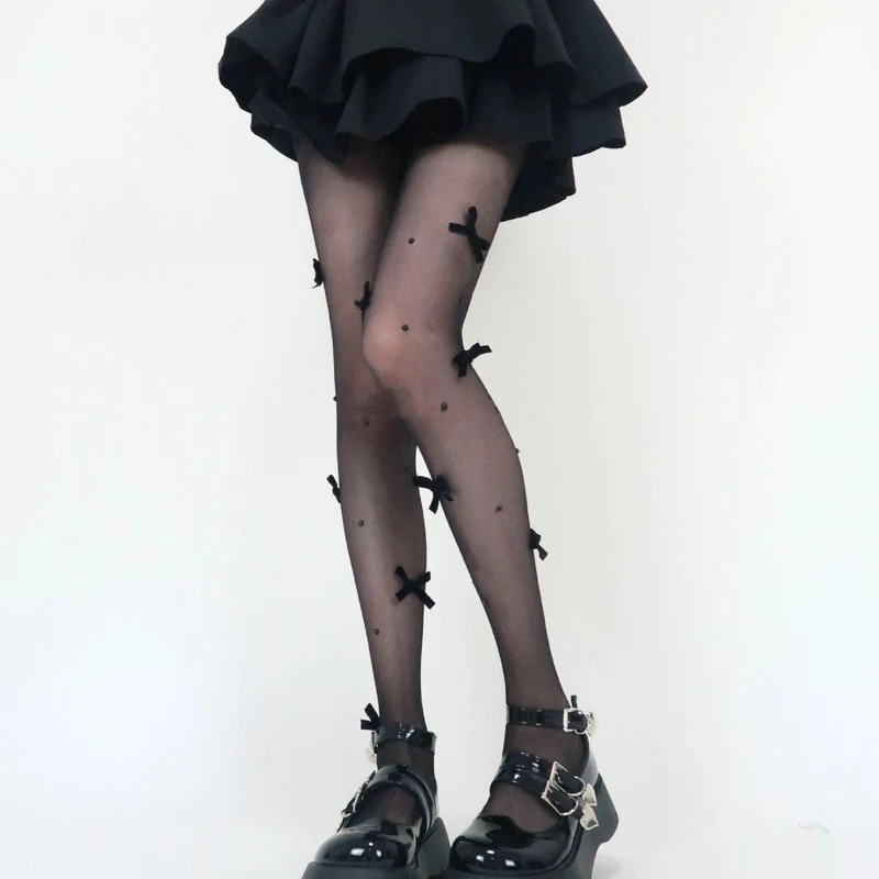 Panty met strik van doorschijnend mesh en imitatieparels