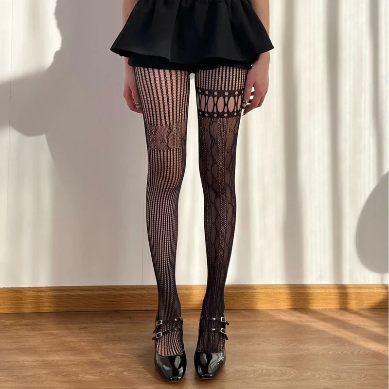Asymmetrische visnetpanty met verticale strepen en uitgeholde zoom