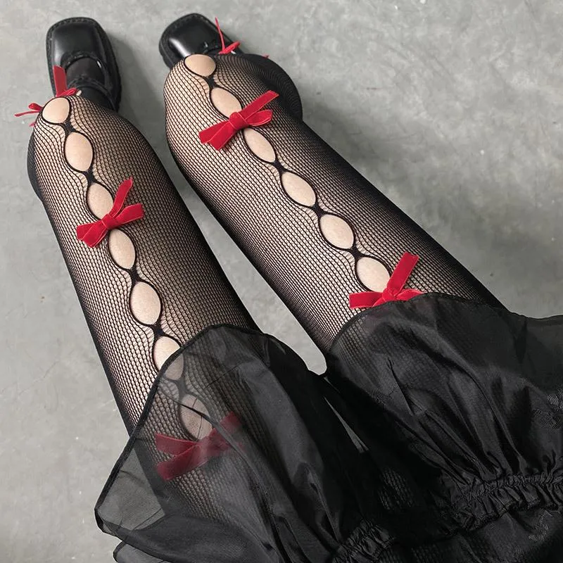 Visnet panty met uitgeholde strik